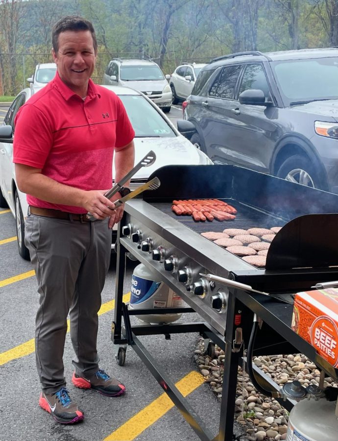 Mr. Forney was in charge of grilling for the event. 
