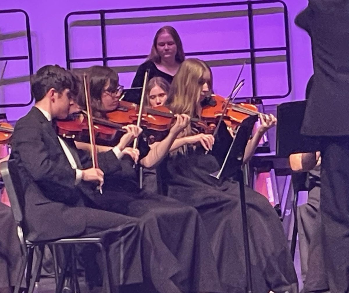 Olivia Ciabbattari (second from left) performs with Sinfonietta at spring concert.