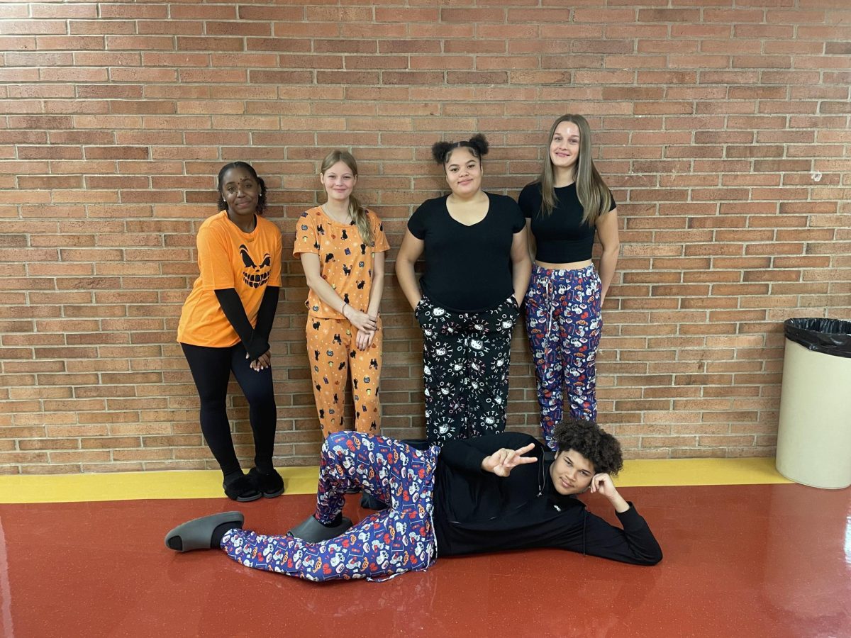 Students pose for Halloween Pajamas Day.